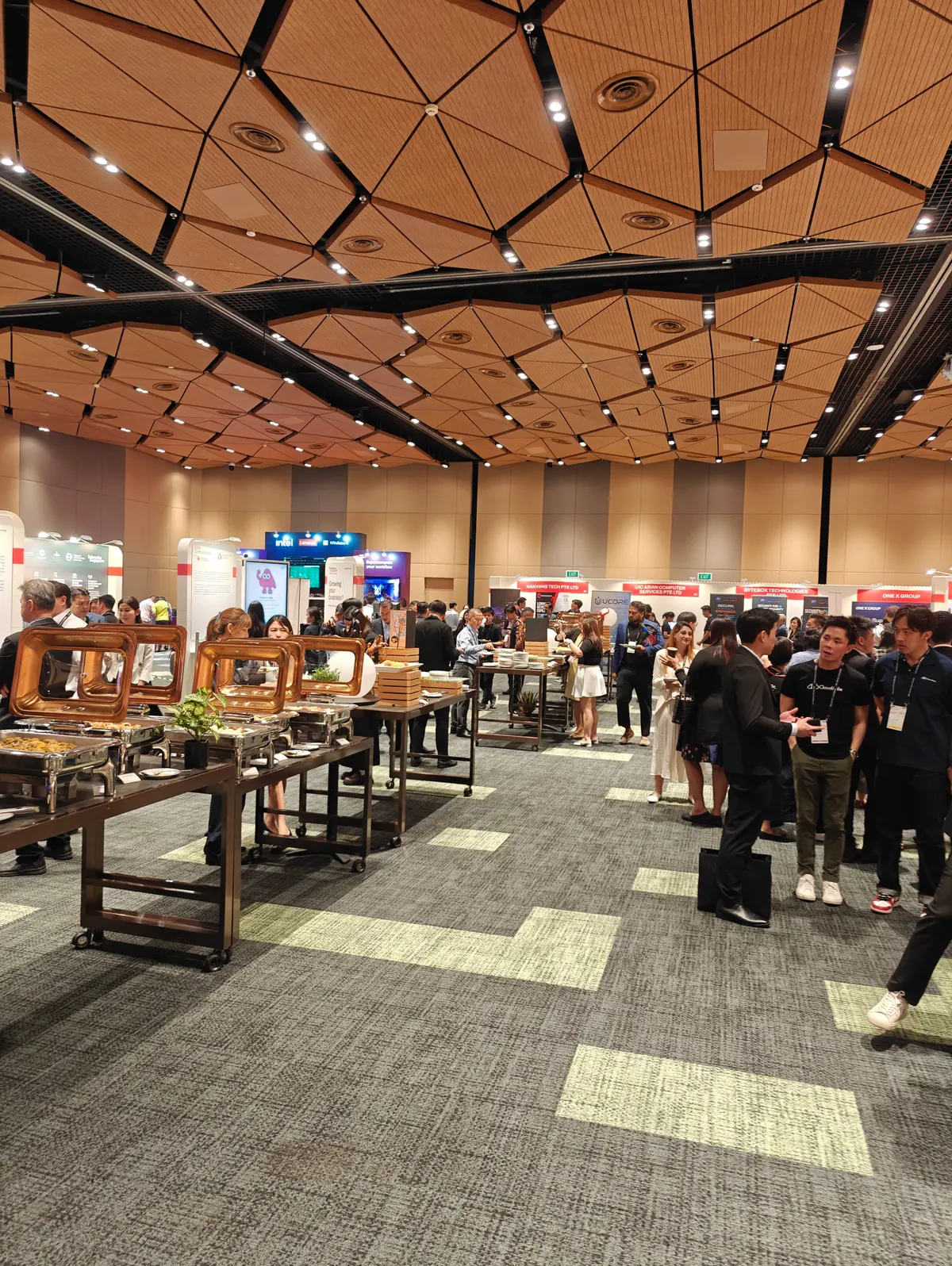 The busy exhibition floor at Singapore EXPO during the conference